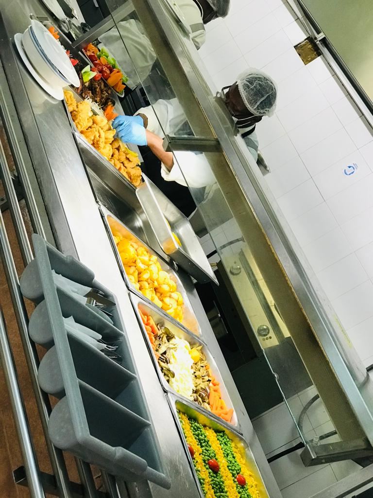 Hot food on a staff canteen serving line