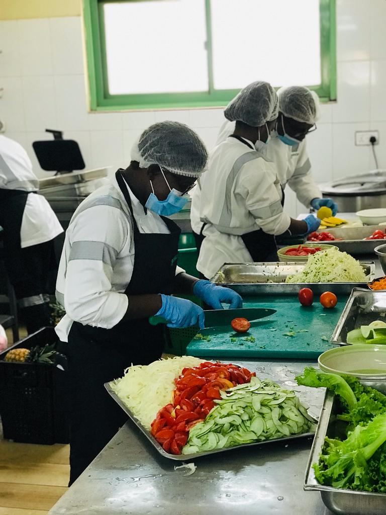 Germisa Catering team preparing fresh vegetables